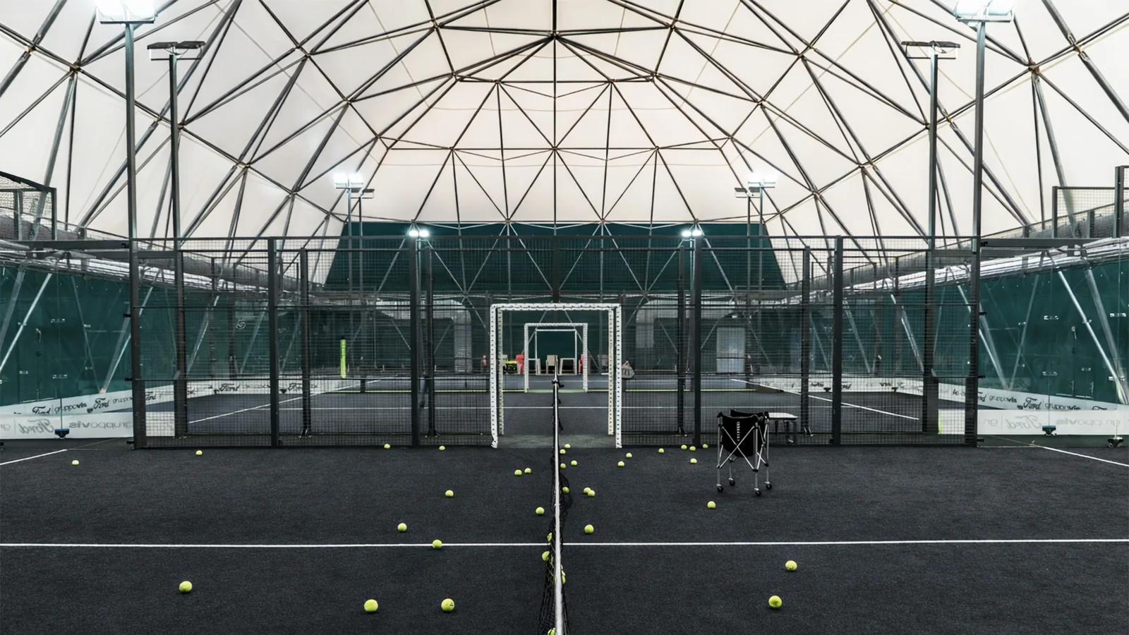 Premium TP Padel courts beneath a covered structure